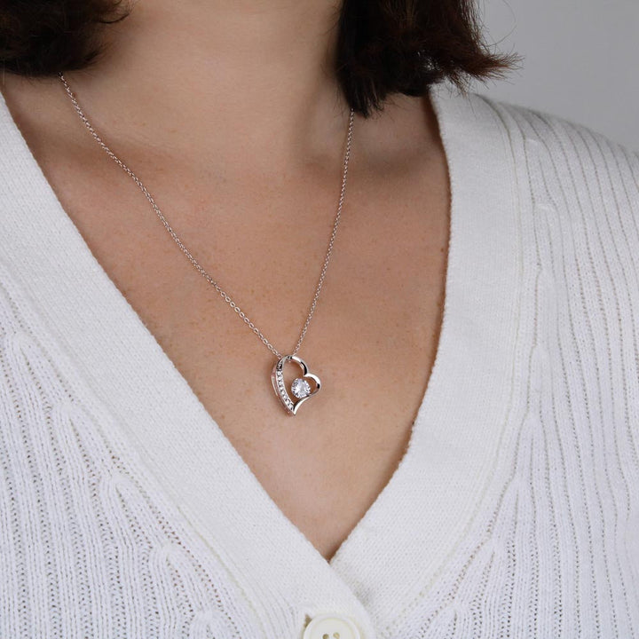 Elegant white gold heart pendant necklace for women. Romantic love jewelry gift for her.