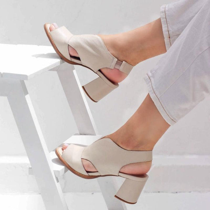 Women's stylish heeled leather sandals by Selina, featuring an ergonomic comfort footbed.