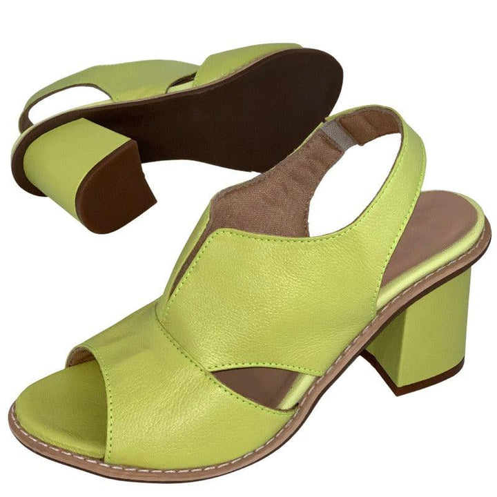 Front view of women's elegant heeled leather sandals, emphasizing comfort and style.