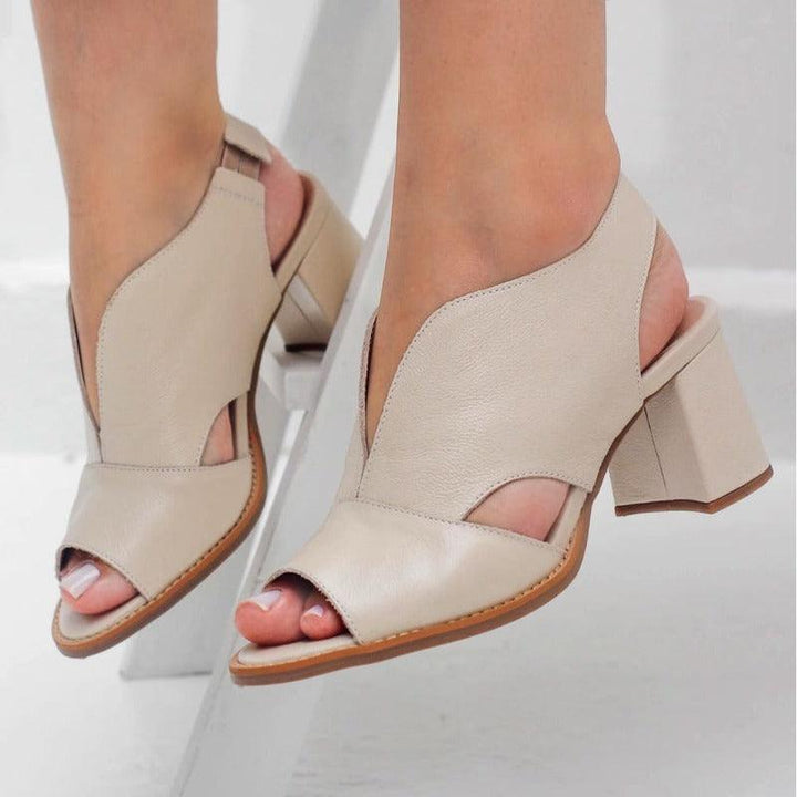 Top view of women's Selina heeled leather sandals, highlighting the design and comfort features.