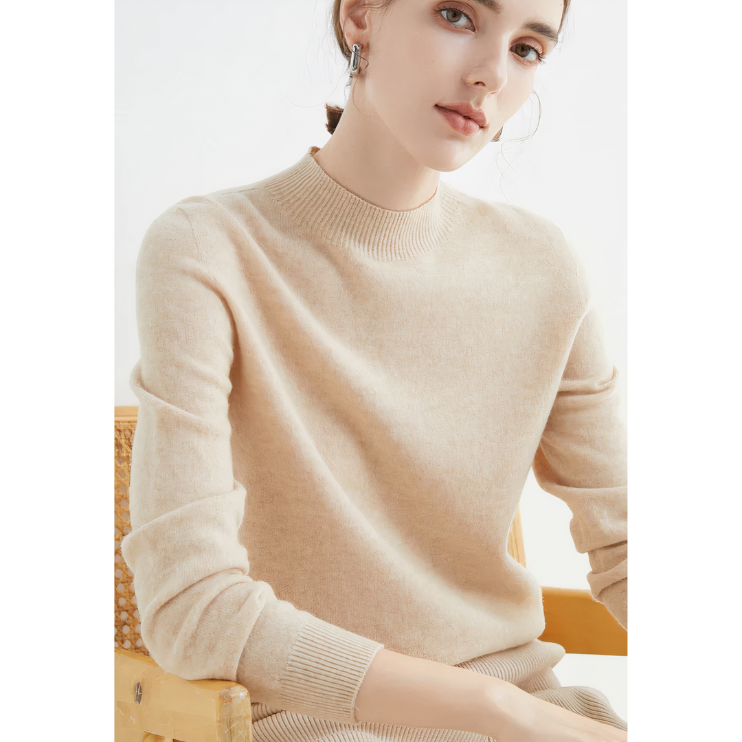 Elegant women's half-neck jumper, a stylish knitted sweater offering soft comfort for winter fashion.