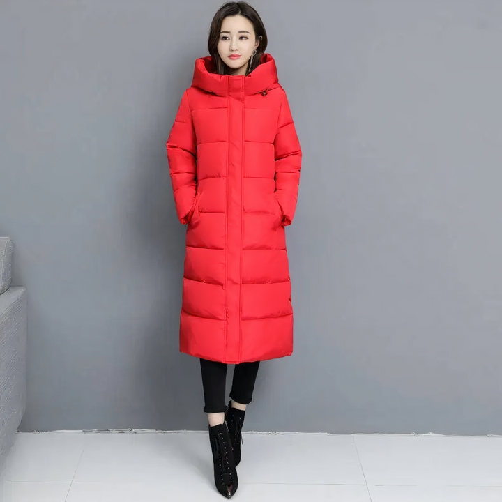 Women's stylish long quilted jacket, perfect for winter warmth. Trendy padded coat for everyday fashion.
