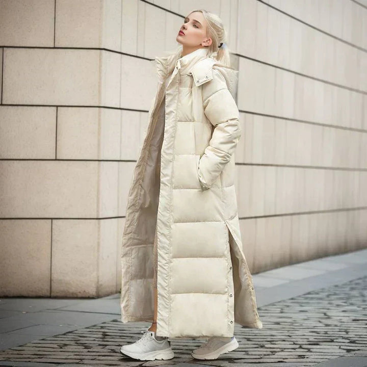 Ladies' long winter coat, offering a blend of warmth, comfort, and timeless style.