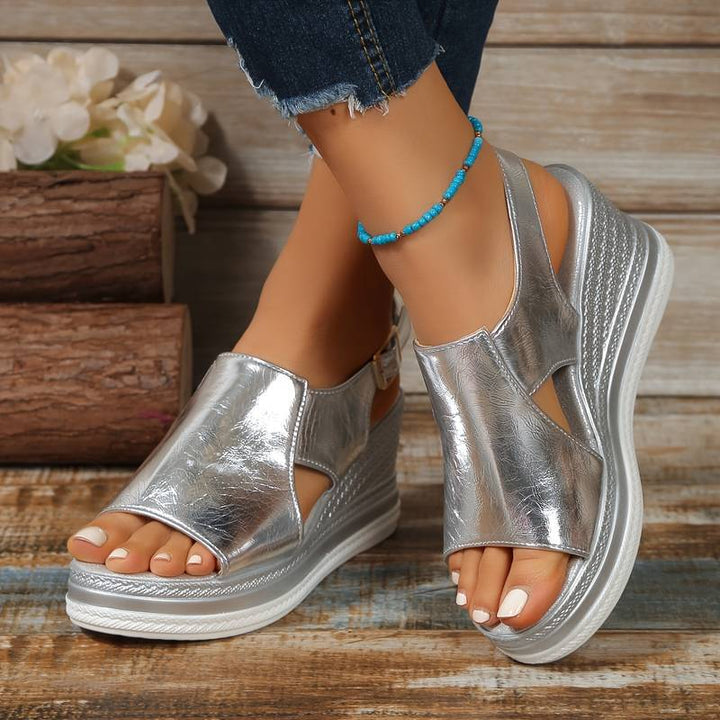 Fashionable women's orthopedic wedge sandals featuring stylish fringe, designed for supportive wear.