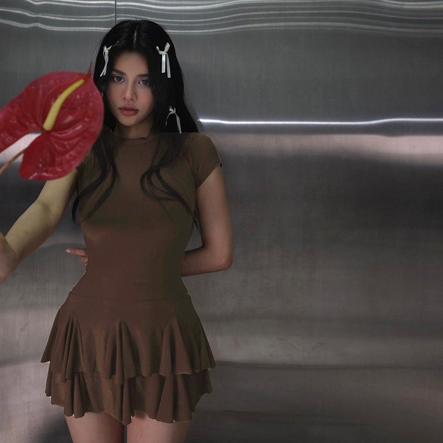 Feminine Nayeli peplum mini dress with round neck, ideal for stylish summer outfits.