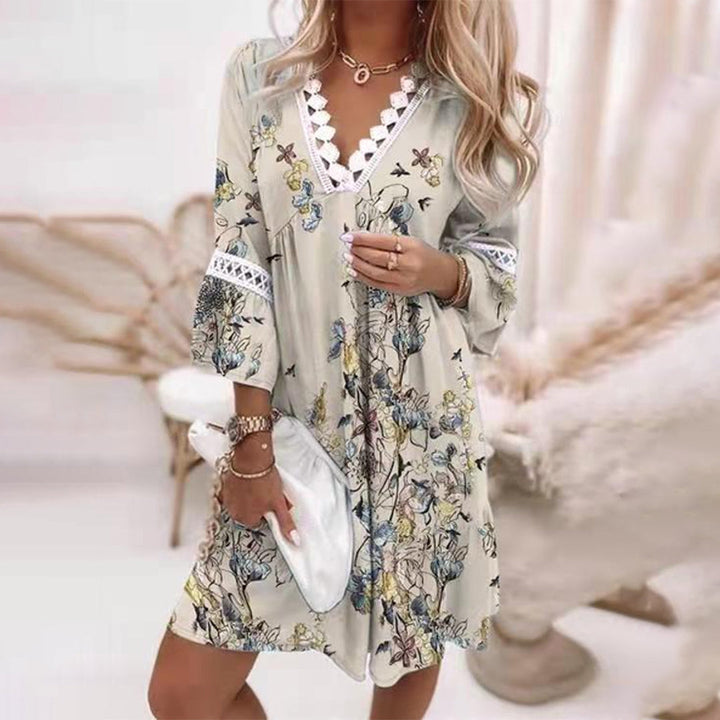 Elegant women's summer printed loose dress, perfect for vacation, casual outings, or daily wear.