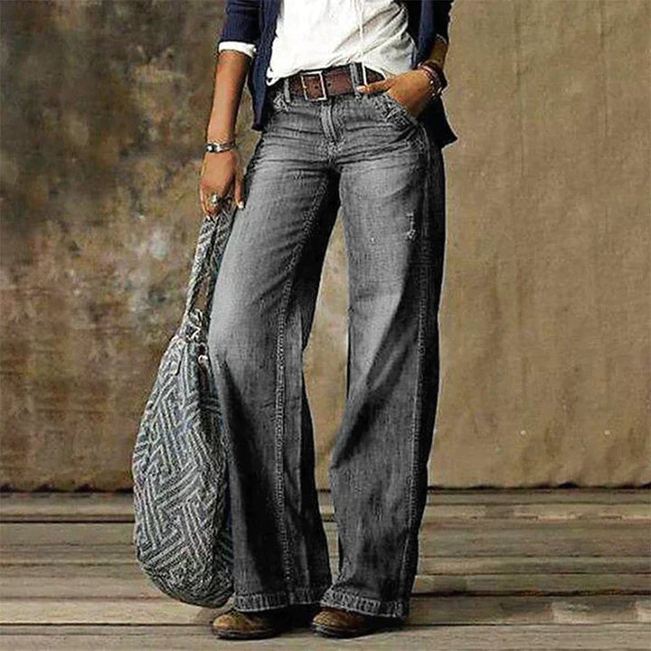 Comfortable wide leg denim trousers for women, featuring a stylish modern fit ideal for everyday wear.