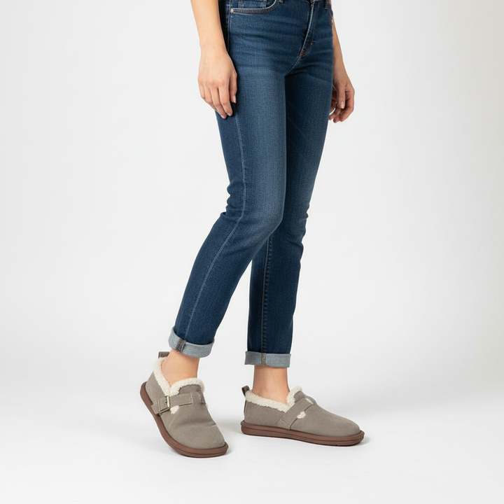 Luxury women's suede slippers, fleece-lined for winter, offering ultimate comfort and warmth