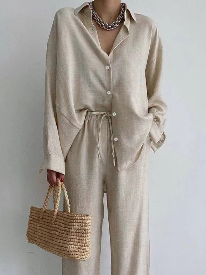 Women's summer two-piece outfit: relaxed fit blouse & flowing wide leg pants. Perfect for beach or vacation wear.