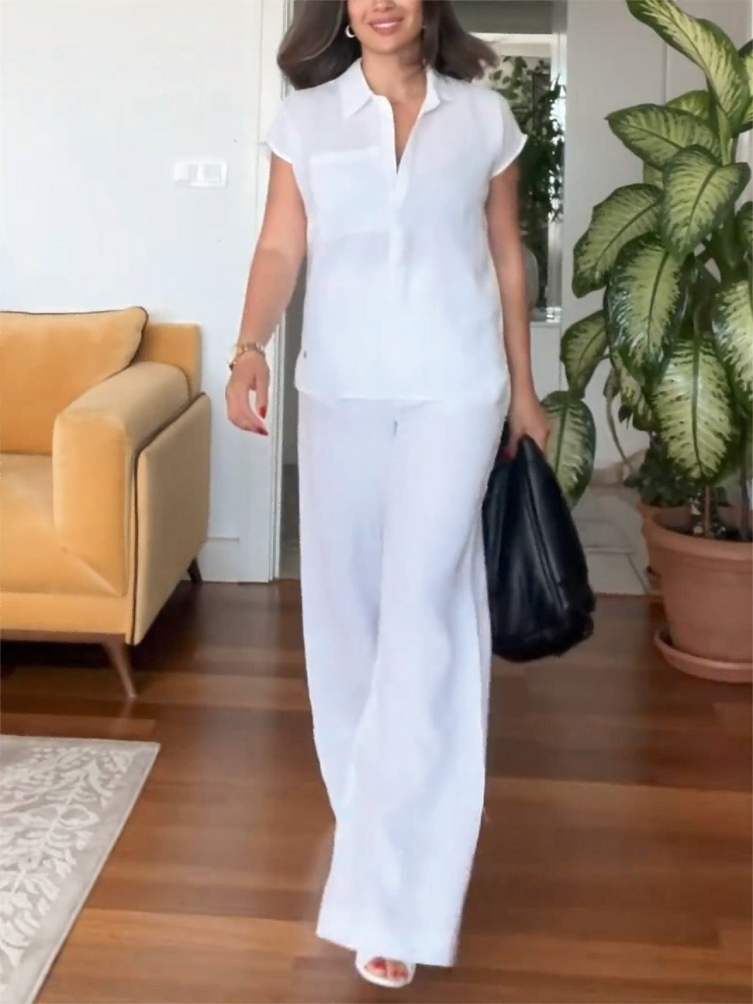 Women's summer two-piece set with short sleeve top & wide leg high-waist pants for effortless style & comfort.