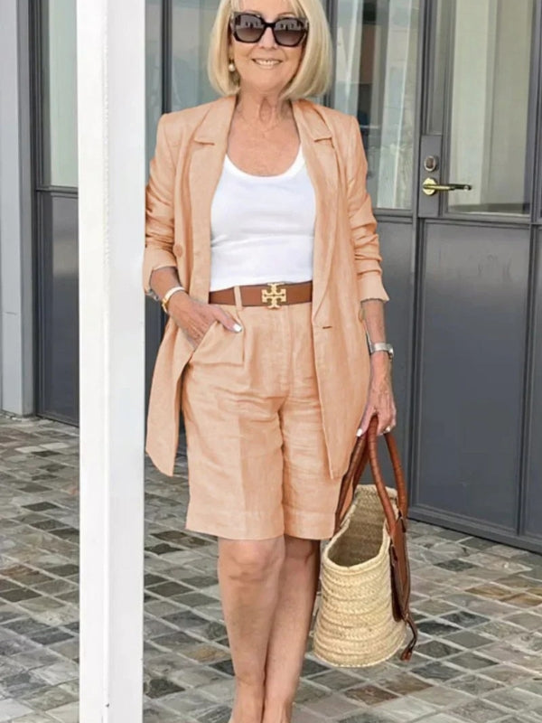Trendy women's linen two-piece set: a chic blazer and high-waist shorts, perfect for summer fashion.