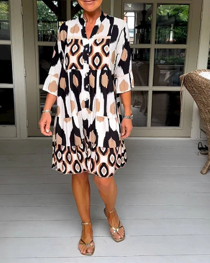 Women's trendy abstract print 3/4 sleeve dress with a loose fit, perfect for summer casual wear.