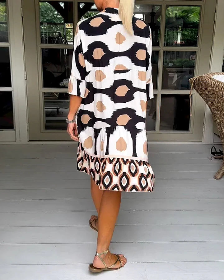 Liora women's trendy 3/4 sleeve abstract print dress, featuring a loose fit and tiered design.