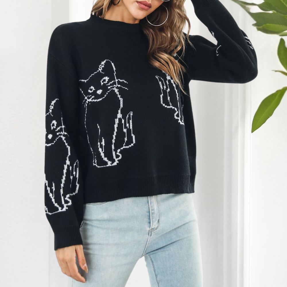Trendy women's pullover sweater featuring a charming cat print, ideal for casual fashion.