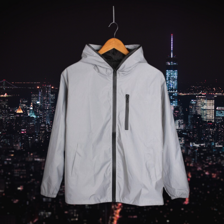 Women's trendy reflective coat for enhanced visibility. Stylish outerwear for evening wear & safety.