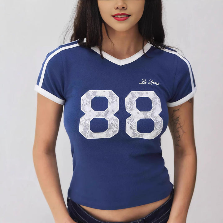 Blue women's t-shirt, sporty chic with lace detail & contrast short sleeves, ideal for summer everyday wear.