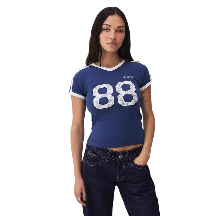 Stylish women's lace top with contrast short sleeves, a comfortable & trendy choice for casual wear.
