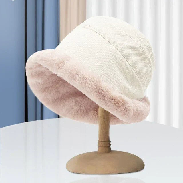 Trendy women's winter hat, super cozy with soft fleece lining & faux fur. Ideal cold weather fashion accessory.