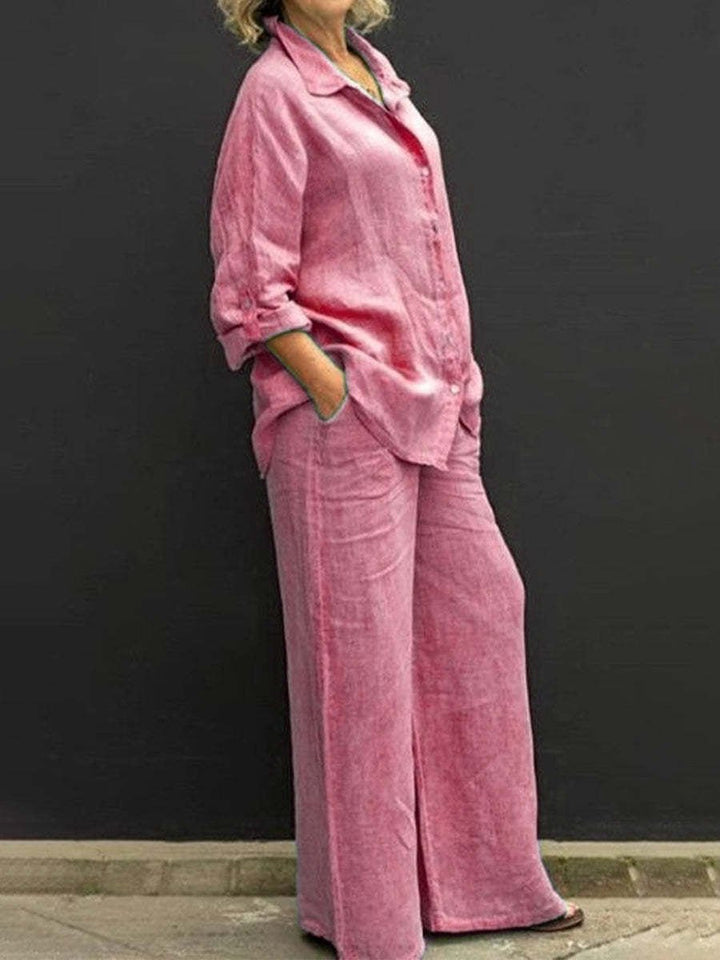 Comfortable women's cotton-linen two-piece summer set, featuring a casual blouse and elegant trousers for versatile wear.