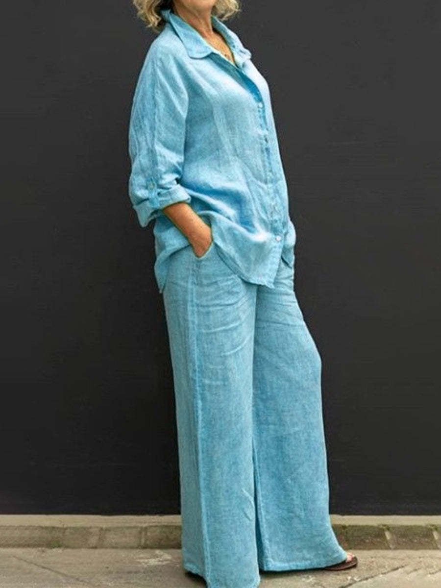 Versatile women's two-piece summer fashion set with a chic blouse and relaxed trousers, perfect for ladies' casual wear.