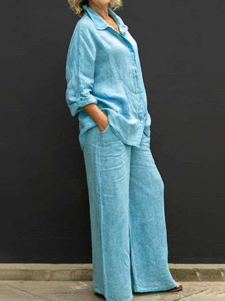 Versatile women's two-piece summer fashion set with a chic blouse and relaxed trousers, perfect for ladies' casual wear.