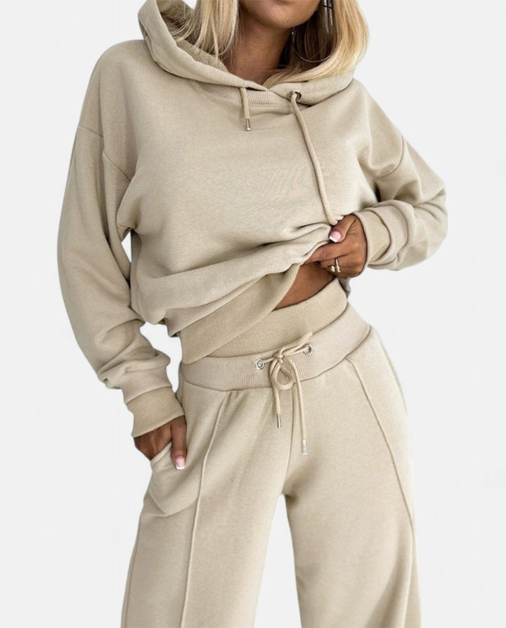 Women's stylish two-tone hoodie set with comfortable wide leg pants. Perfect modern casual loungewear.