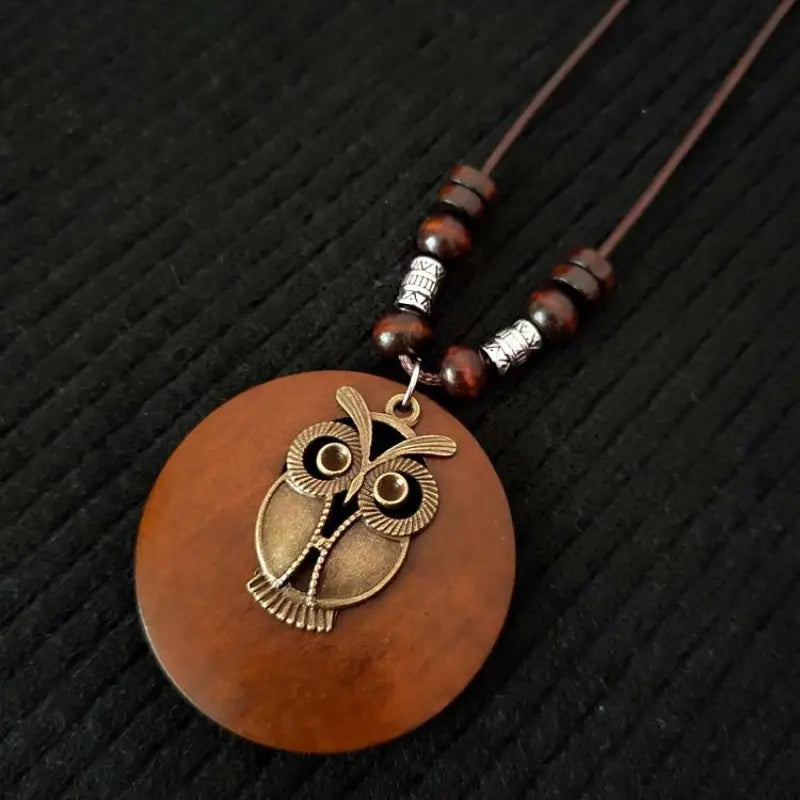 Women's unique boho wooden necklace featuring a retro round pendant.