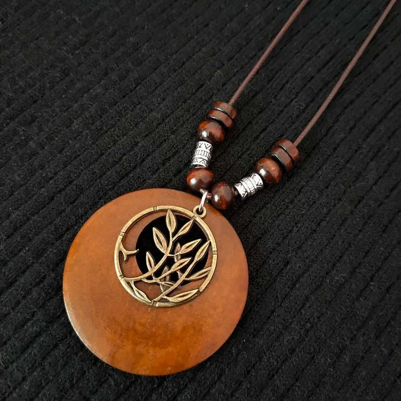 Handcrafted natural wooden boho necklace, unique retro round pendant jewelry.