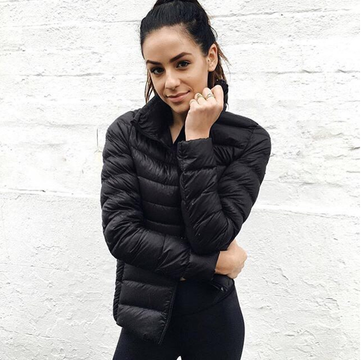 Women's Urban Chic Puffer Jacket: a lightweight, water-repellent coat for modern style & fall fashion.