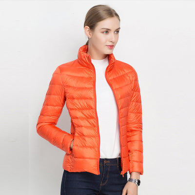Fall/winter women's water-repellent puffer jacket, a chic & practical urban outerwear essential.