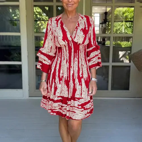 Everyday women's V-neck dress. A-line, 3/4 sleeve, casual & flowy. A perfect printed knee-length option for any season.