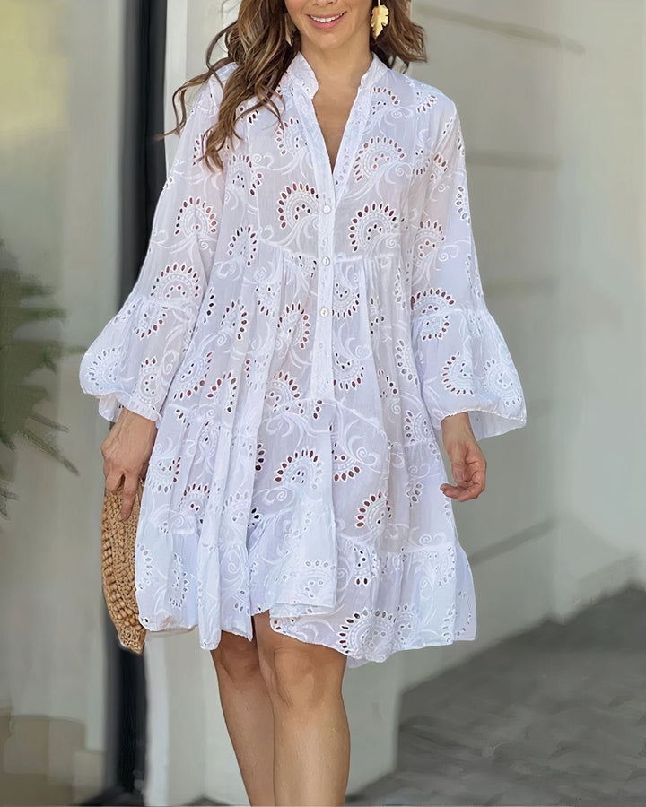 Effortless women's V-neck collared dress with three-quarter sleeves, a chic and casual summer day dress.