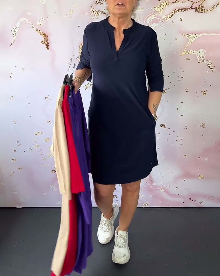 Women's V-neck midi dress with convertible sleeves, perfect for versatile casual, travel, or office wear.