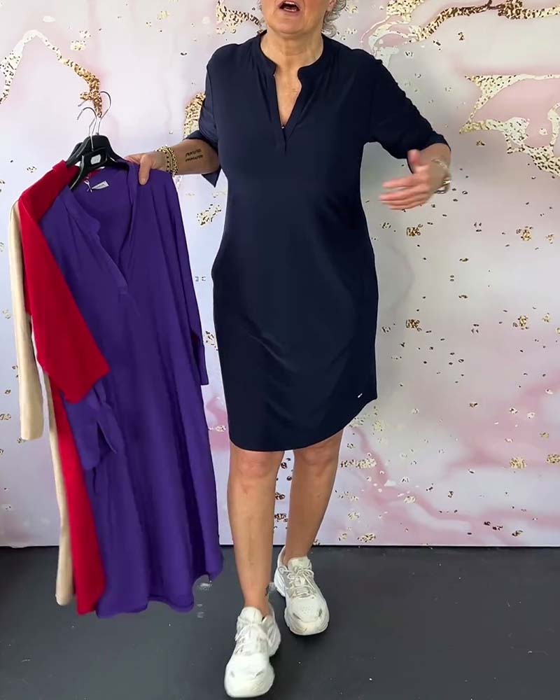 Navy V-neck midi dress with convertible sleeves for women, ideal for summer casual or travel style.