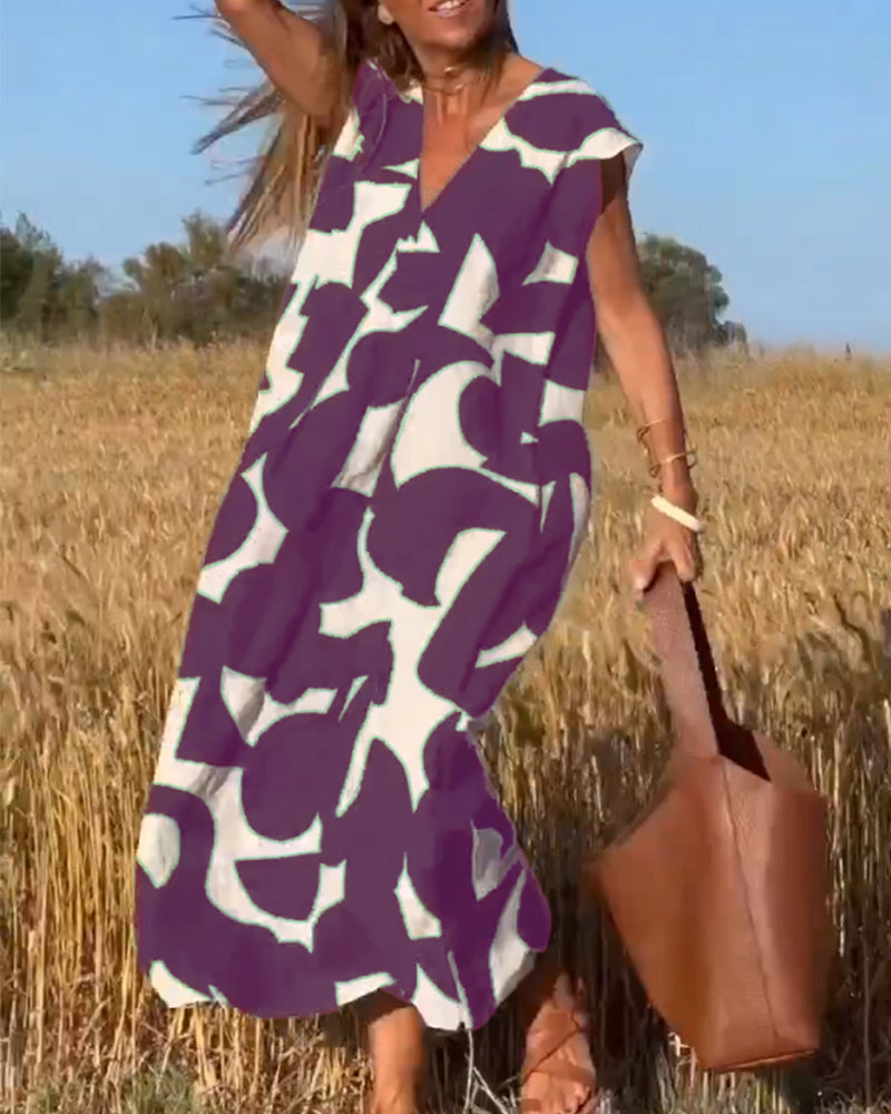 Versatile V-Neck Maxi Dress for women, featuring a bold print for summer fashion and holidays.