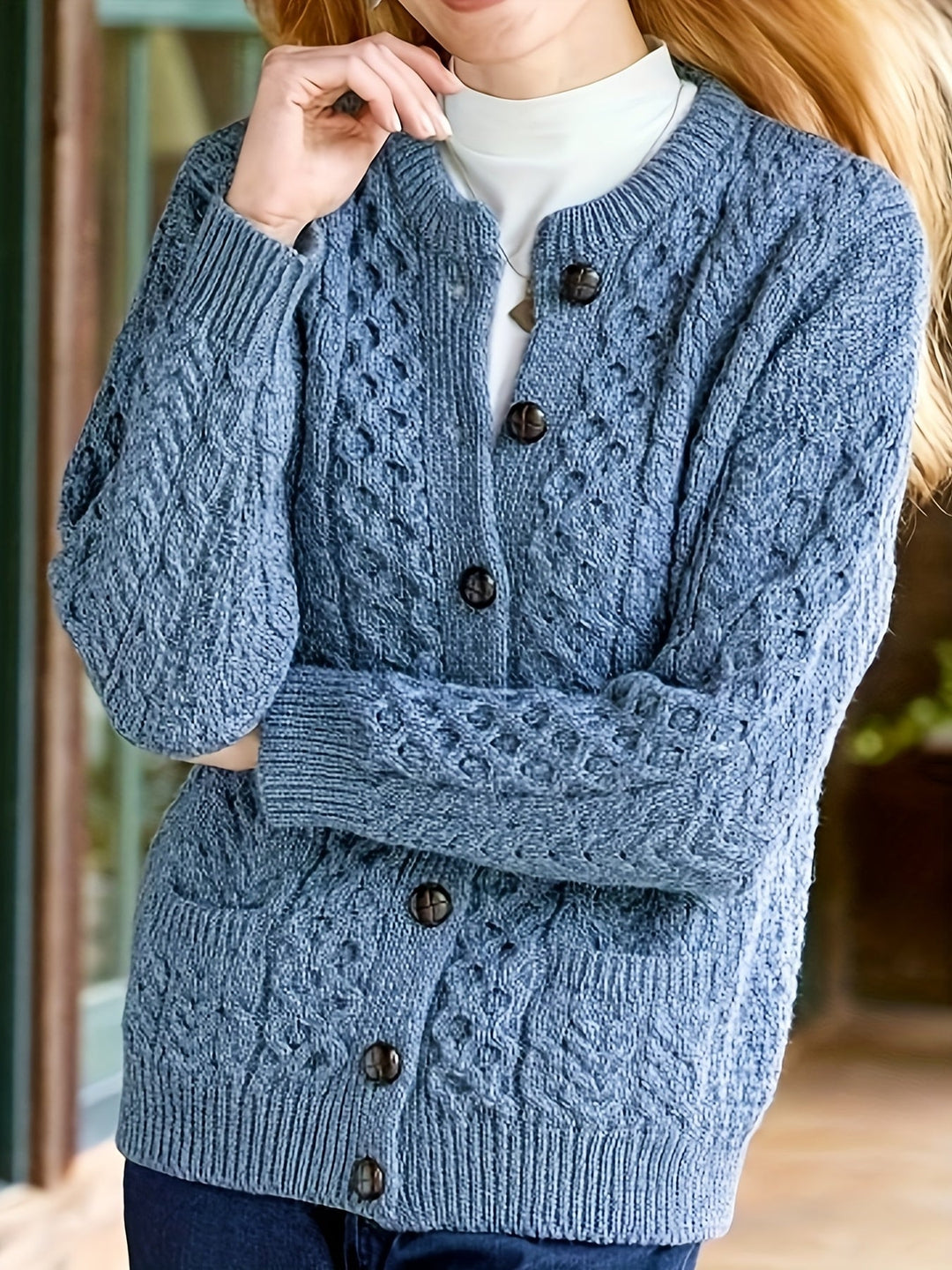 Stylish gray button-down women's cardigan, an essential versatile piece for fall and winter.