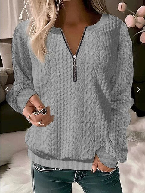 Chic women's jacquard knitwear sweater. Round neck, long sleeve pullover, essential for autumn fashion.