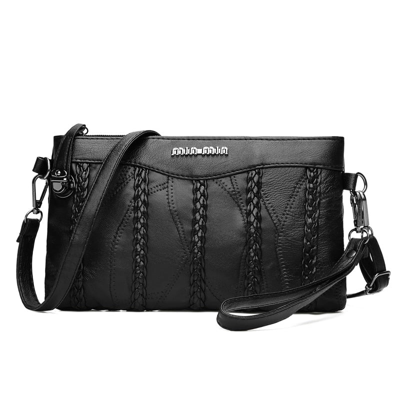 Women's versatile PU leather crossbody clutch bag with spacious interior, ideal for everyday and evening use.