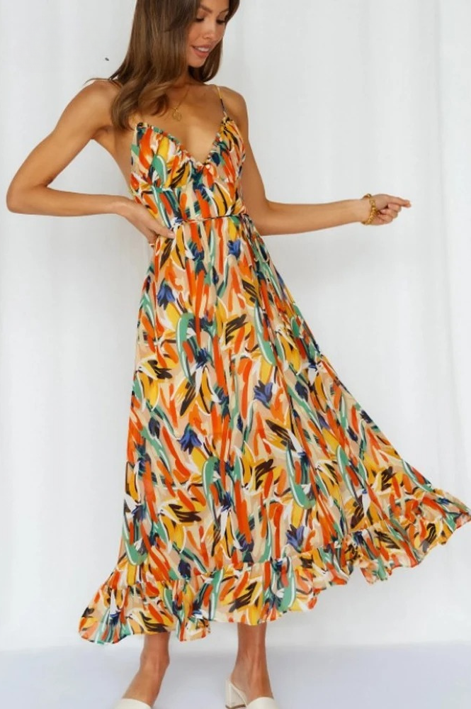 Beautiful floral print sleeveless summer dress for women, a comfortable and vibrant choice for beachwear.