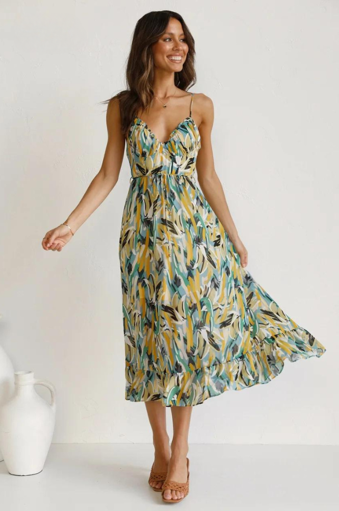 Women's elegant floral print sleeveless summer dress, comfortable and flowy, suitable for casual occasions.