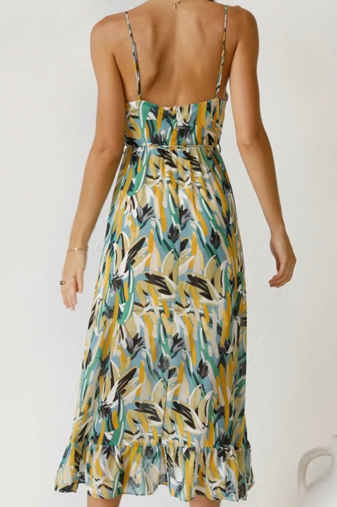 Sleeveless floral summer dress for women with a v-neck and vibrant print, ideal for vacation beachwear.