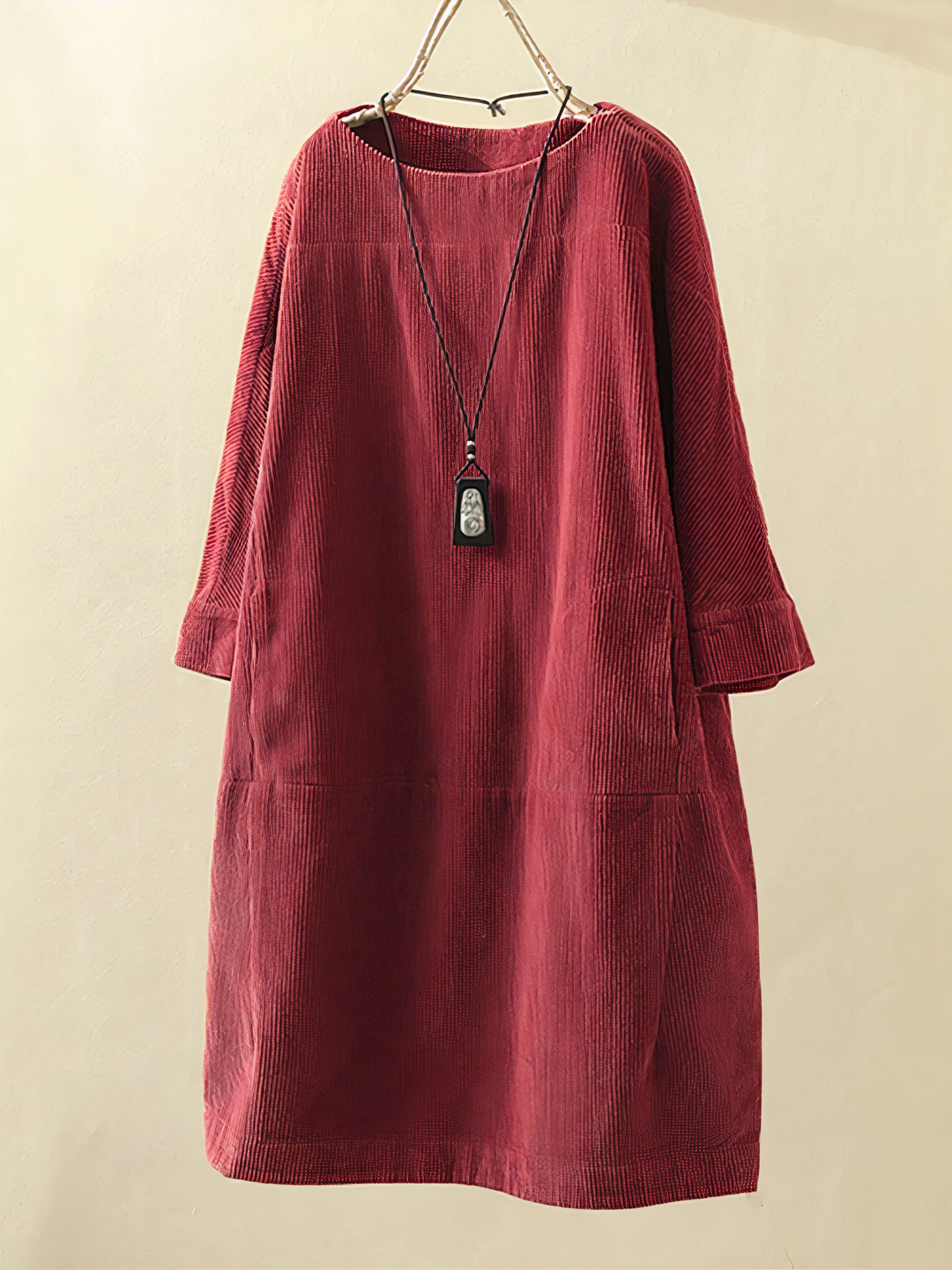 Chic women's vintage A-line midi dress. Corduroy fabric, long sleeves, and round neck for elegant fall fashion.