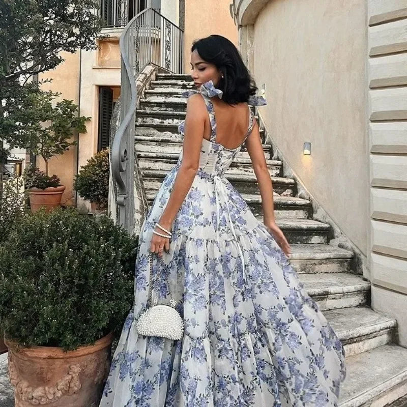 Elegant women's blue floral strapless evening gown, ideal for formal events & special occasion parties.