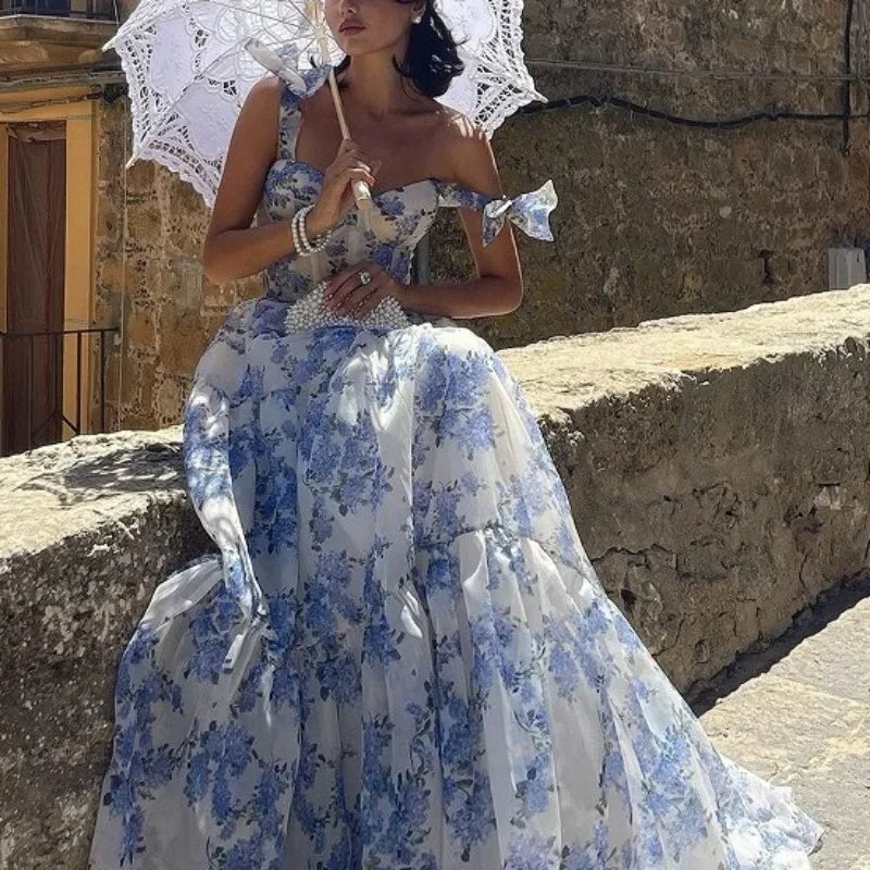 Stunning women's vintage blue floral strapless evening gown. A chic, formal long dress for autumn/winter events.