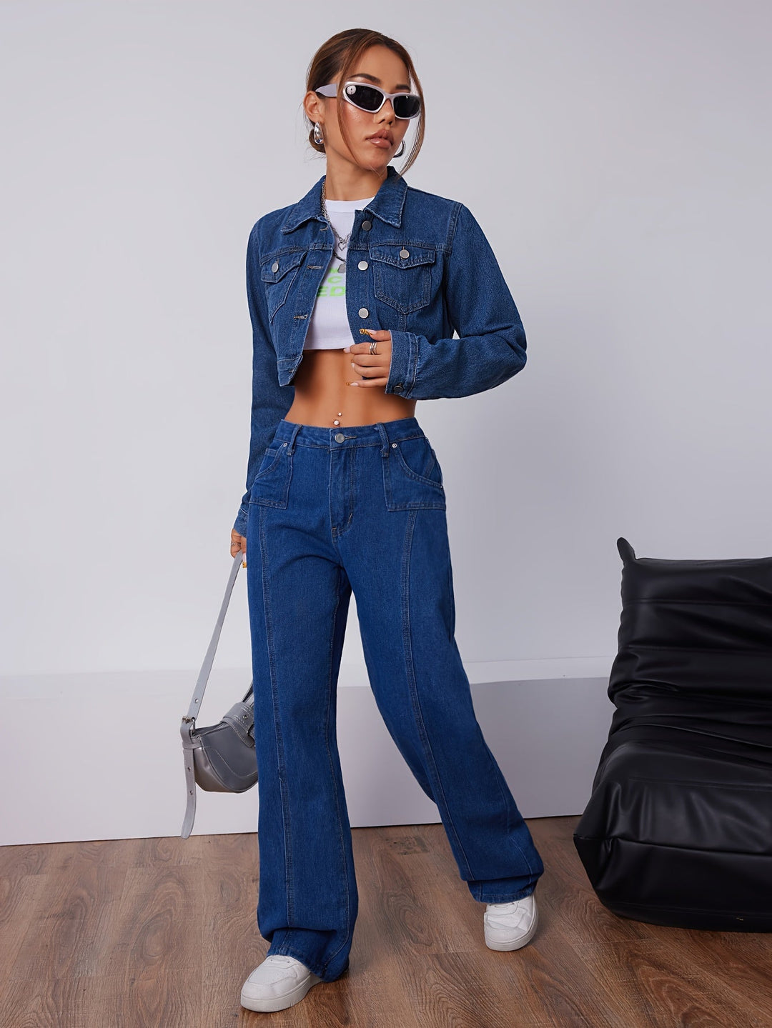 Women's vintage blue short fitted denim jacket, perfect for casual wear.