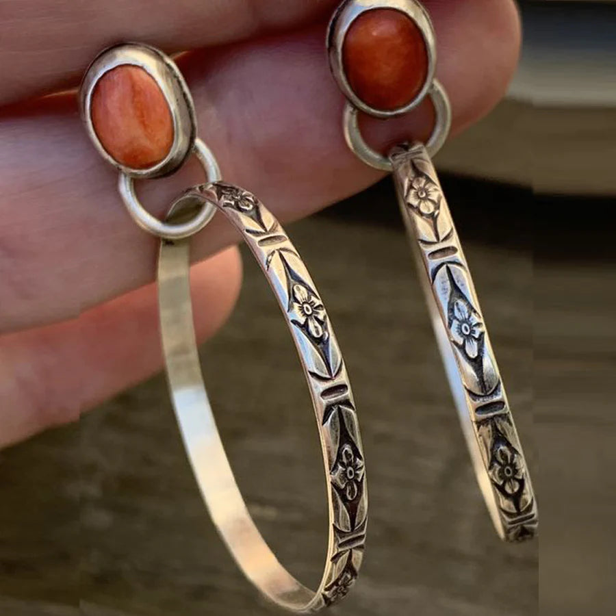Women's vintage Bohemian onyx drop earrings. Elegant handmade gemstone jewelry with a unique bohemian style.