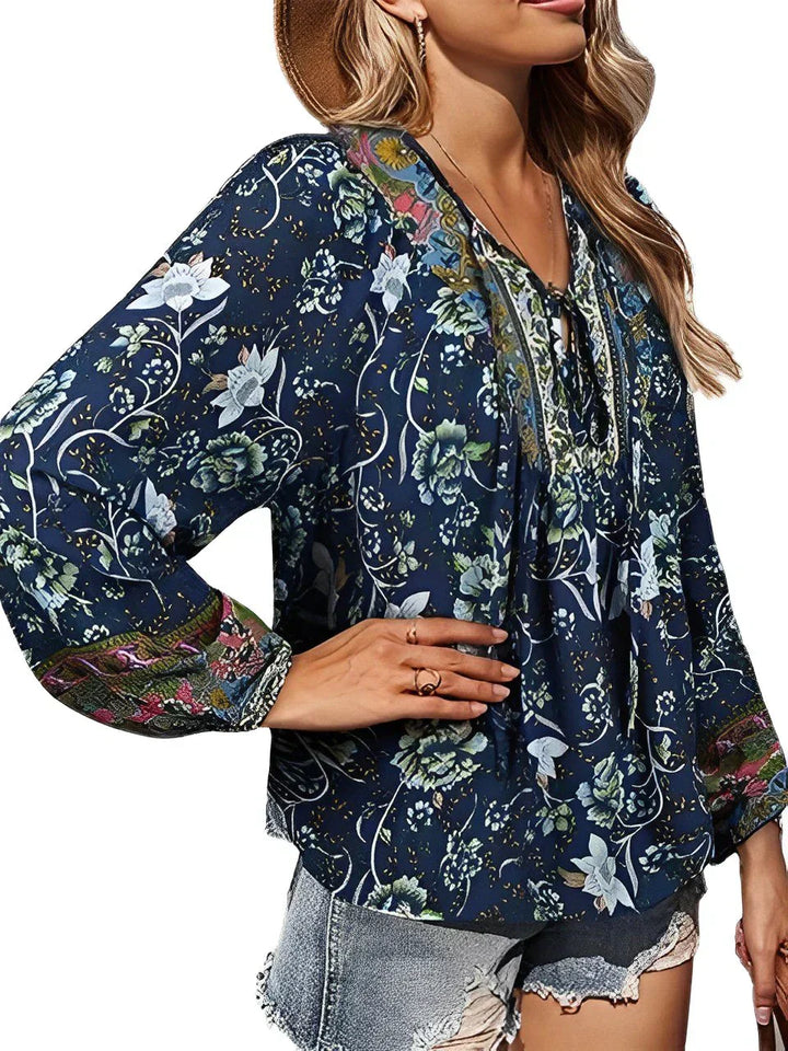 Vintage inspired women's summer blouse, floral print, long sleeves, and flowy bohemian style.