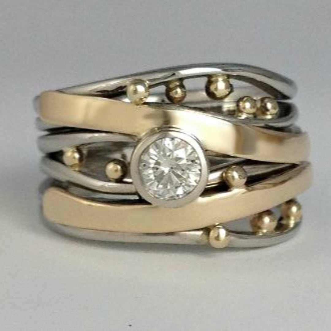 Women's vintage gold ring with sparkling zirconia, perfect for an elegant statement. Timeless fashion jewelry.
