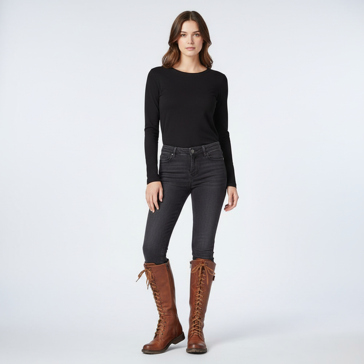 Womens fashion knee-high boots, vintage design with full lace-up front and comfortable flat heel.