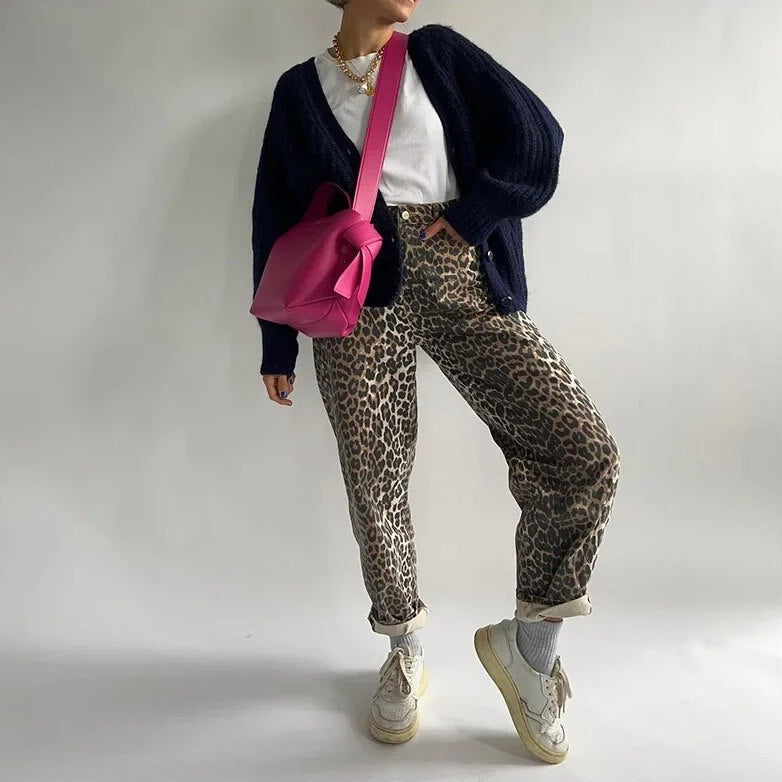 Women's vintage leopard print high waist jeans. Stylish & comfy stretch denim bottoms for a trendy look.